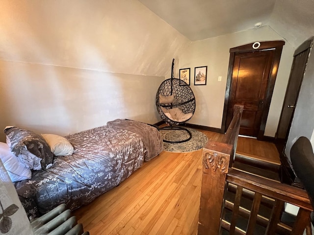 6326 W Berenice Ave, Chicago, IL 60634 - bedroom featuring vaulted ceiling and hardwood / wood-style flooring