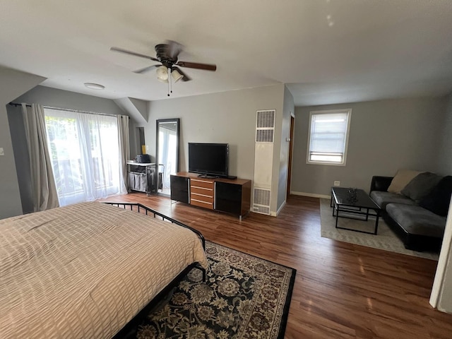 6326 W Berenice Ave, Chicago, IL 60634 - bedroom with a heating unit, wood finished floors, and a ceiling fan