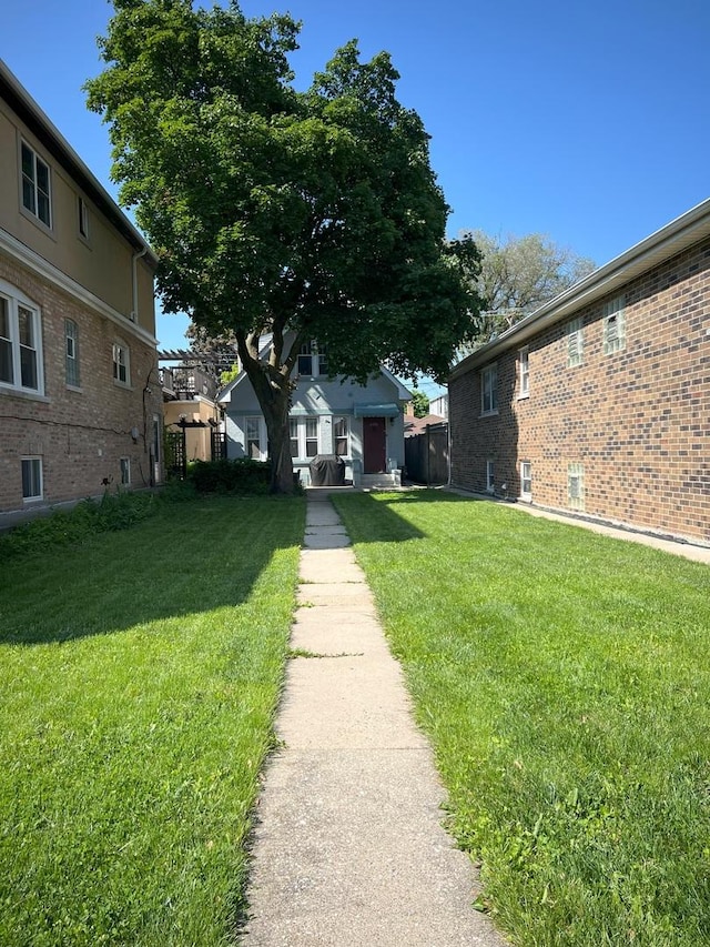 6326 W Berenice Ave, Chicago, IL 60634 - view of green lawn featuring a residential view