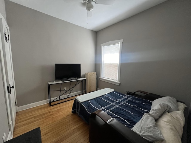 6326 W Berenice Ave, Chicago, IL 60634 - bedroom featuring wood finished floors, lofted ceiling, and ceiling fan