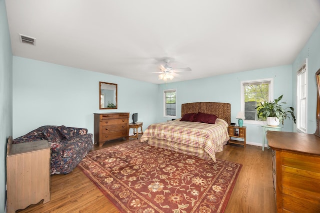 401 Greenwood Rd, Glenview, IL 60025 - bedroom with wood finished floors and a ceiling fan