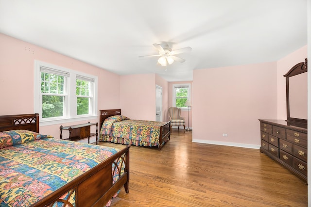 401 Greenwood Rd, Glenview, IL 60025 - bedroom with light wood-style floors and ceiling fan