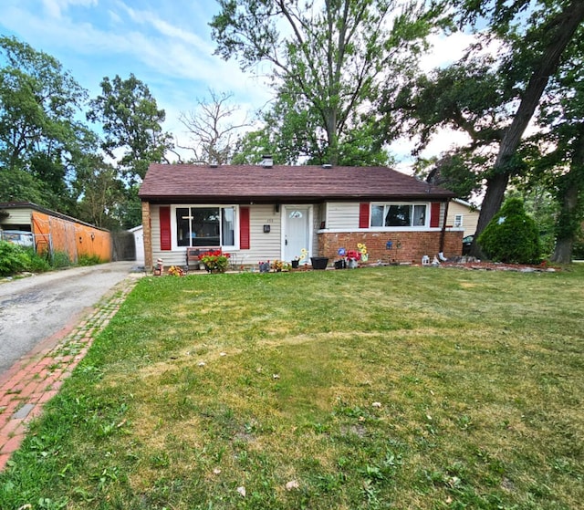 355 Oswego St, Park Forest, IL 60466 - view of front of house with driveway and a front yard