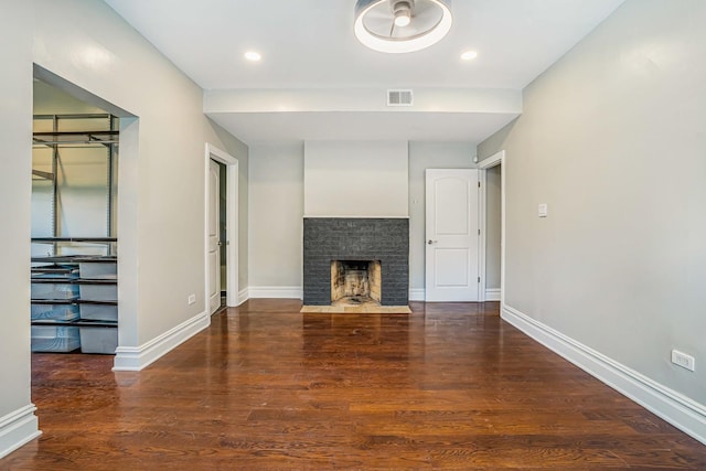4640 N Kenmore Ave Unit 2S, Chicago, IL 60640 - unfurnished living room with wood finished floors, a fireplace with flush hearth, and recessed lighting