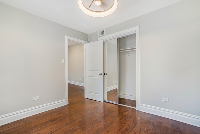 4640 N Kenmore Ave Unit 2S, Chicago, IL 60640 - unfurnished bedroom with wood finished floors and a closet