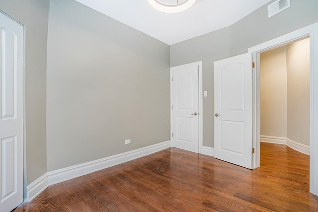 4640 N Kenmore Ave Unit 2S, Chicago, IL 60640 - unfurnished bedroom featuring wood finished floors and baseboards