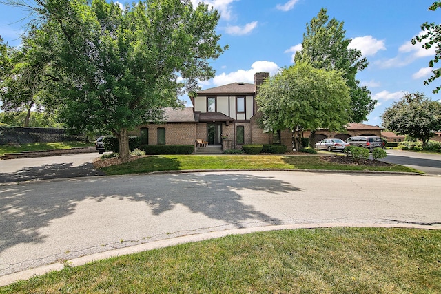 12256 S Arbor Trl Unit 11W, Palos Heights, IL 60463 - tudor house with a chimney