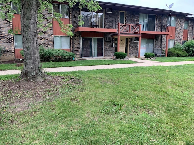 247 N Neltnor Blvd Unit E-1A, West Chicago, IL 60185 - view of front facade featuring brick siding and a front yard