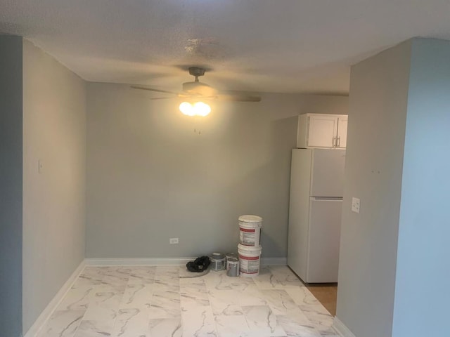 247 N Neltnor Blvd Unit E-1A, West Chicago, IL 60185 - empty room featuring ceiling fan, light marble finish flooring, and a textured ceiling