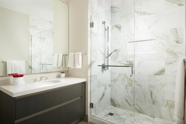 363 E Wacker Dr Unit 3303, Chicago, IL 60601 - bathroom featuring vanity and a marble finish shower