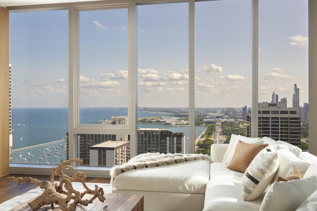 363 E Wacker Dr Unit 3303, Chicago, IL 60601 - living area featuring wood finished floors, a water view, healthy amount of natural light, and a city view