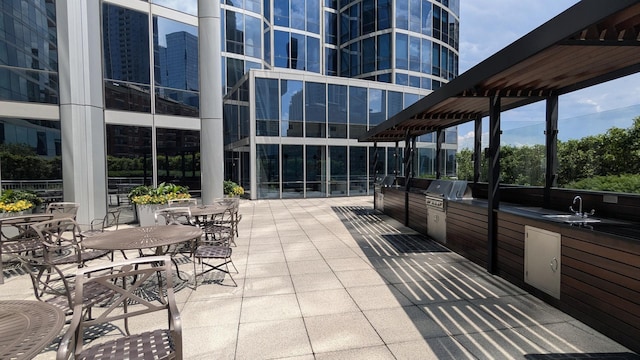 1211 S Prairie Ave Unit 2904, Chicago, IL 60605 - view of patio / terrace with an outdoor kitchen and a sink