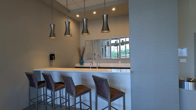 1211 S Prairie Ave Unit 2904, Chicago, IL 60605 - kitchen with recessed lighting, a towering ceiling, and a breakfast bar area