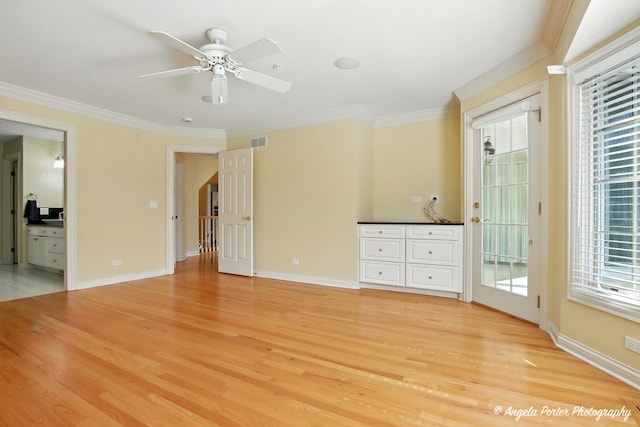 32756 N Stone Manor Dr, Grayslake, IL 60030 - spare room with light wood-style floors, crown molding, and a ceiling fan