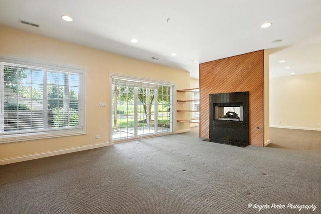 32756 N Stone Manor Dr, Grayslake, IL 60030 - unfurnished living room with recessed lighting, carpet, and a multi sided fireplace