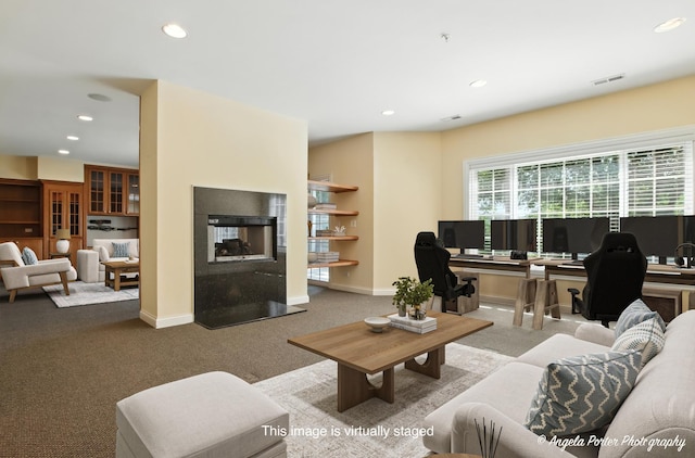 32756 N Stone Manor Dr, Grayslake, IL 60030 - carpeted living area with recessed lighting, a multi sided fireplace, and a desk