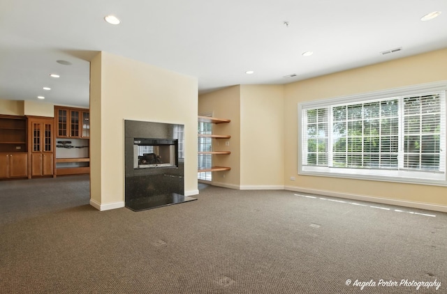 32756 N Stone Manor Dr, Grayslake, IL 60030 - unfurnished living room featuring a multi sided fireplace, carpet, and recessed lighting
