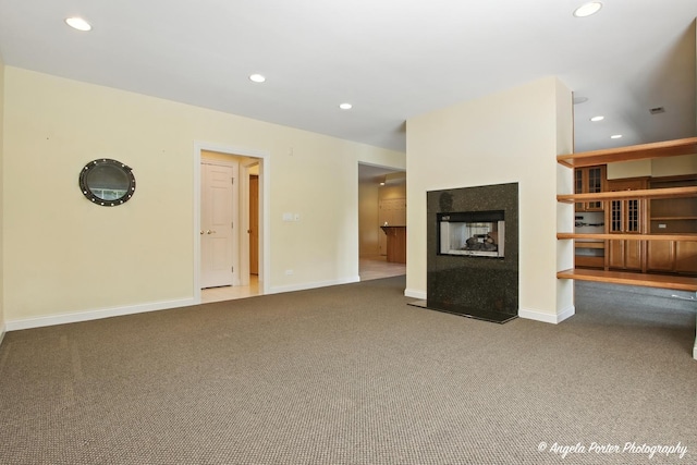 32756 N Stone Manor Dr, Grayslake, IL 60030 - unfurnished living room with carpet floors, a multi sided fireplace, and recessed lighting
