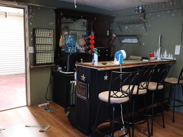 303 N Walnut St, Wenona, IL 61377 - indoor bar featuring wood finished floors