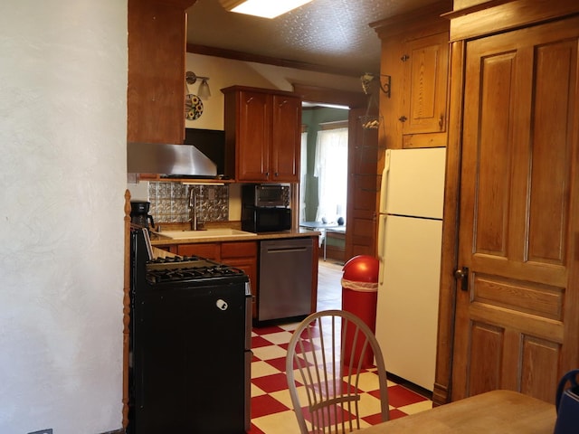 303 N Walnut St, Wenona, IL 61377 - kitchen featuring appliances with stainless steel finishes, light flooring, wall chimney exhaust hood, light countertops, and brown cabinetry