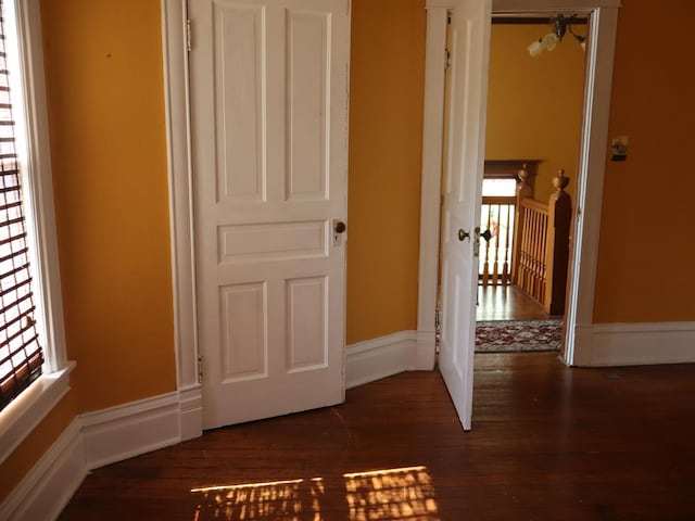 303 N Walnut St, Wenona, IL 61377 - corridor with dark wood-style flooring