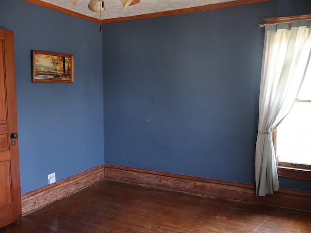 303 N Walnut St, Wenona, IL 61377 - spare room featuring wood-type flooring and ceiling fan