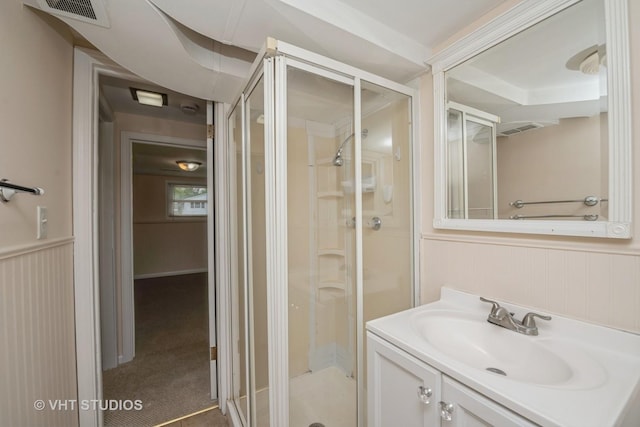 401 Elden Dr, Cary, IL 60013 - full bathroom featuring a shower stall, vanity, and a wainscoted wall