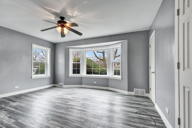 2425 Flossmoor Rd, Flossmoor, IL 60422 - empty room with ceiling fan and wood finished floors