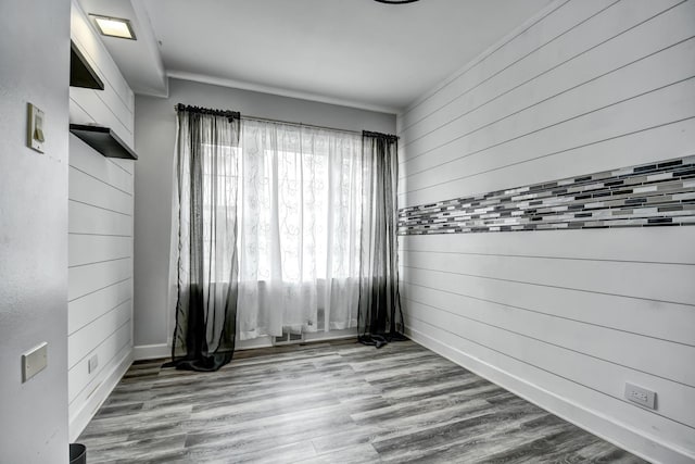 2425 Flossmoor Rd, Flossmoor, IL 60422 - spare room with wooden walls and wood finished floors