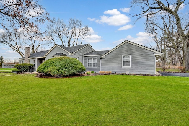 2425 Flossmoor Rd, Flossmoor, IL 60422 - view of front of property with a front lawn and a shingled roof
