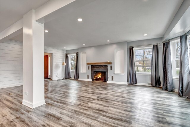 2425 Flossmoor Rd, Flossmoor, IL 60422 - unfurnished living room featuring wood finished floors, recessed lighting, a brick fireplace, and wood walls
