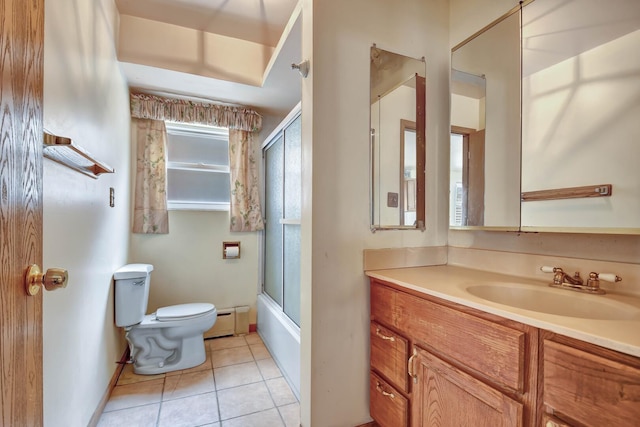6238 S Kolmar Ave, Chicago, IL 60629 - full bath with a baseboard radiator, vanity, tile patterned flooring, and enclosed tub / shower combo
