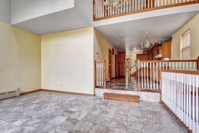 6238 S Kolmar Ave, Chicago, IL 60629 - unfurnished living room featuring a chandelier, a towering ceiling, and marble finish flooring