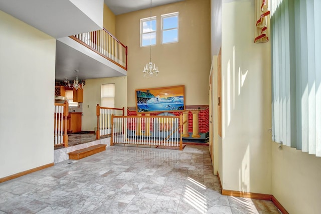 6238 S Kolmar Ave, Chicago, IL 60629 - foyer featuring a chandelier and a towering ceiling