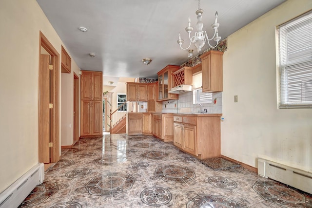 6238 S Kolmar Ave, Chicago, IL 60629 - kitchen featuring baseboard heating, a chandelier, glass insert cabinets, and backsplash
