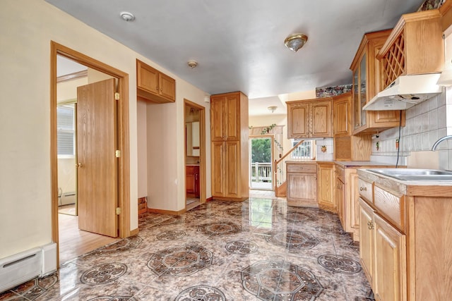 6238 S Kolmar Ave, Chicago, IL 60629 - kitchen featuring a baseboard heating unit, light marble finish flooring, light countertops, glass insert cabinets, and a baseboard radiator