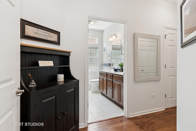 4015 Chesapeake Ln, Naperville, IL 60564 - hall with light wood-style flooring and baseboards
