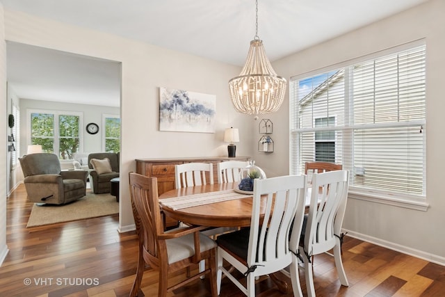 4015 Chesapeake Ln, Naperville, IL 60564 - dining room with wood finished floors, healthy amount of natural light, and a chandelier