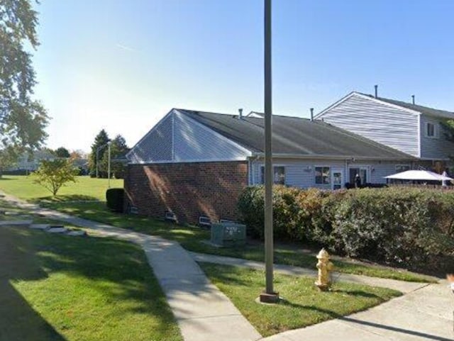 400 Salem Sq Unit 000, Bolingbrook, IL 60440 - view of side of home with a yard