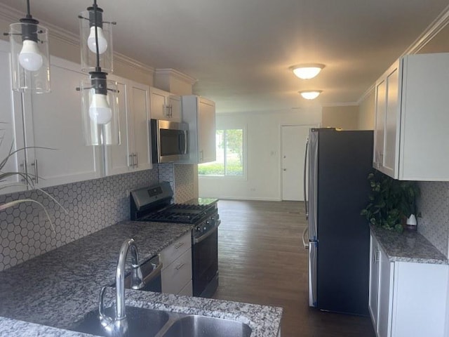 400 Salem Sq Unit 000, Bolingbrook, IL 60440 - kitchen featuring appliances with stainless steel finishes, dark wood finished floors, backsplash, light stone counters, and ornamental molding