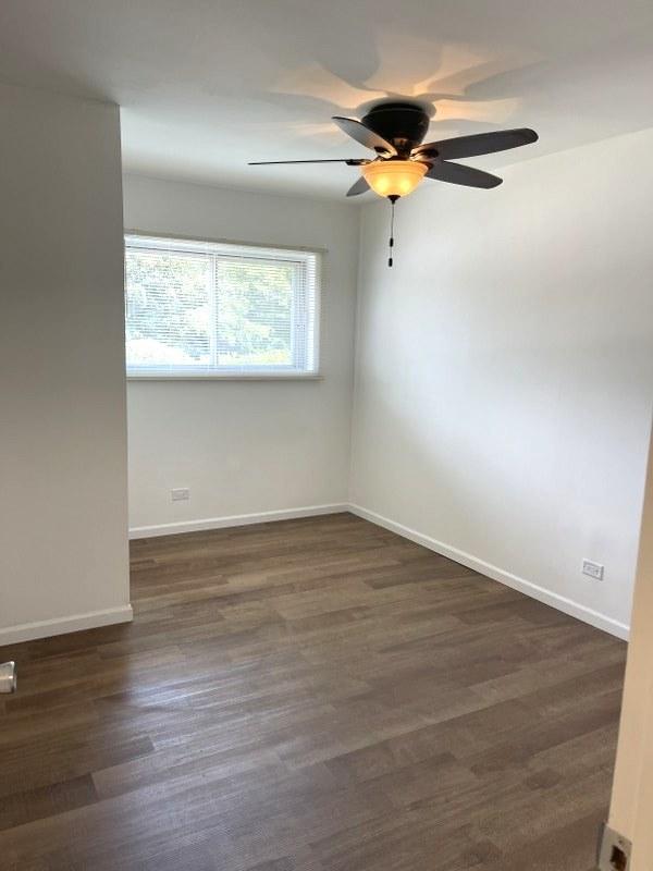 400 Salem Sq Unit 000, Bolingbrook, IL 60440 - unfurnished room featuring ceiling fan and dark wood-style floors