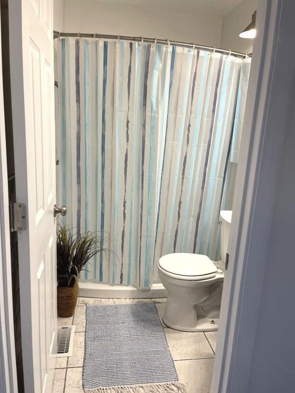 400 Salem Sq Unit 000, Bolingbrook, IL 60440 - full bathroom with tile patterned flooring and curtained shower