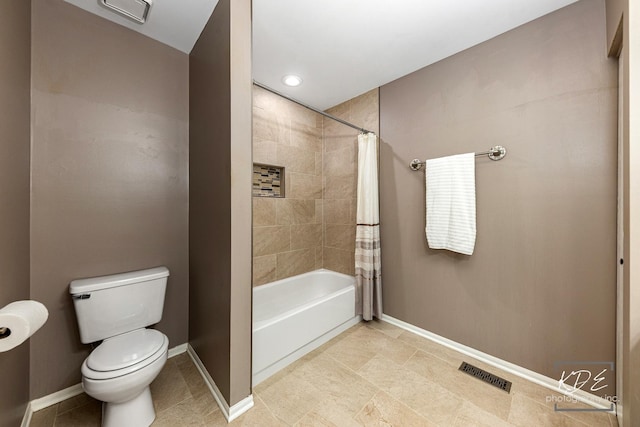 1008 Lakewood Cir, Naperville, IL 60540 - bathroom featuring baseboards and shower / bath combo with shower curtain