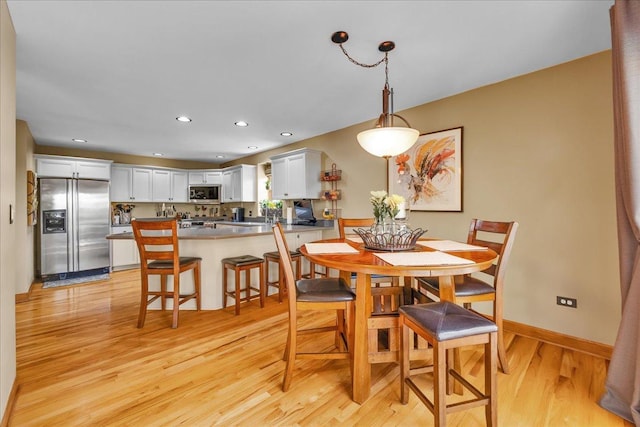 531 Danbury Dr, Oswego, IL 60543 - dining space featuring light wood-style flooring and recessed lighting