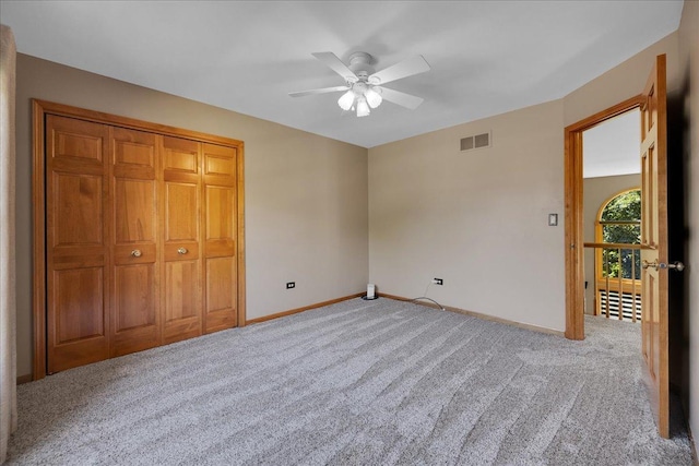 531 Danbury Dr, Oswego, IL 60543 - unfurnished bedroom with carpet, ceiling fan, and a closet