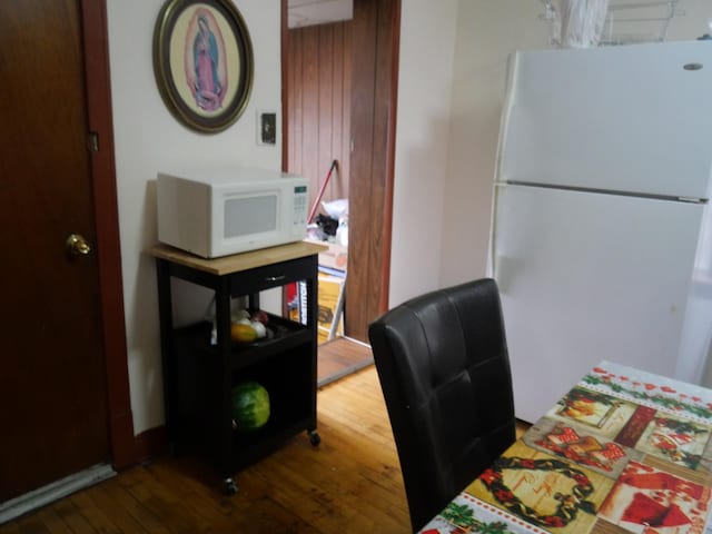 4417 S Campbell Ave, Chicago, IL 60632 - bedroom with freestanding refrigerator and hardwood / wood-style floors