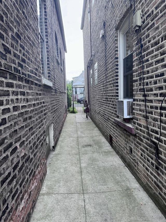 4417 S Campbell Ave, Chicago, IL 60632 - view of side of property featuring brick siding and cooling unit