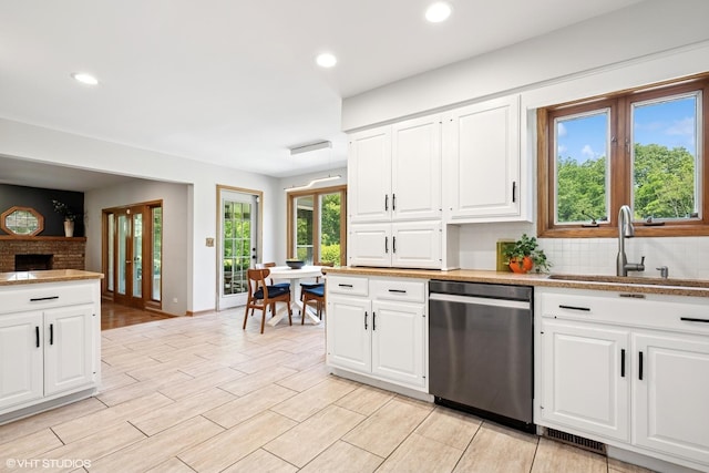 6579 Windham Ln, Long Grove, IL 60047 - kitchen with dishwasher, backsplash, recessed lighting, white cabinetry, and light countertops