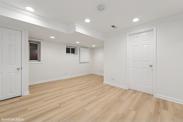 6579 Windham Ln, Long Grove, IL 60047 - finished below grade area with ornamental molding, light wood-style floors, and recessed lighting