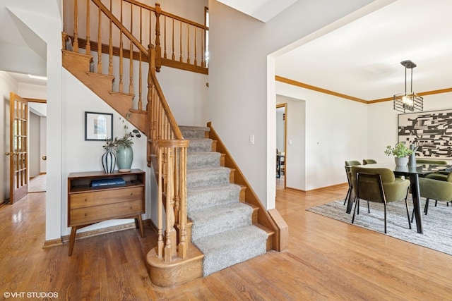 6579 Windham Ln, Long Grove, IL 60047 - stairs with wood finished floors and ornamental molding